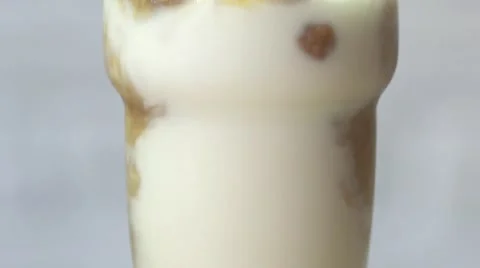 Ice latte, rotating slow motion. Close up shot Stock-Footage 67903069