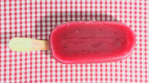 Ice Lolly On Gingham Melting Stock Footage 10879228
