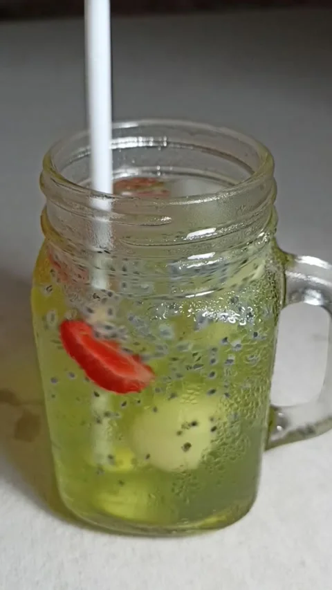 Ice Lychee and strawberry squash in a jar Stock Footage 158977599