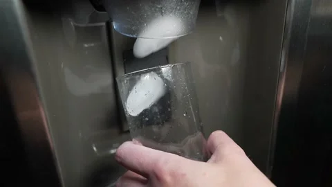 Ice machine drops ice cubes slow motion Stock Footage 156223363