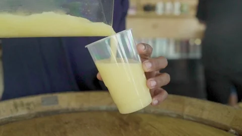 Ice Made Juice in Plastic Cup Stock Footage 106556300
