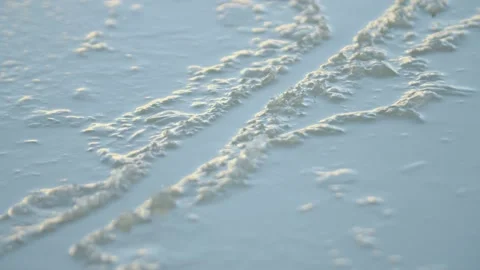 Ice melting and cracking on the surface of water Stock Footage 146265638