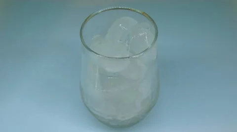 Ice melting in Glass Video stock 64698331