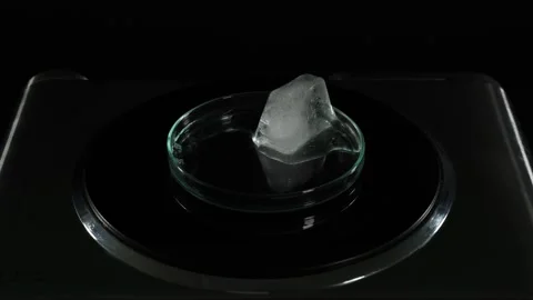Ice Melting on a Hot Surface Stock Footage 276531473