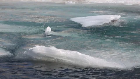 Ice melting on the river in the spring Stock Footage 75441106