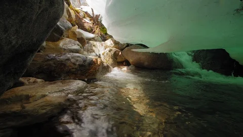 Ice melting in the spring and turing into the stream or river closeup Video stock 92151463