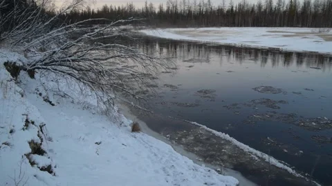 Ice movement along the river, winter landscape at sunset Stock Footage 163877042