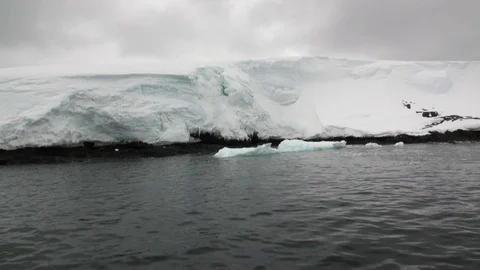Ice movement and snow coastline in ocean of Antarctica. Stock Footage