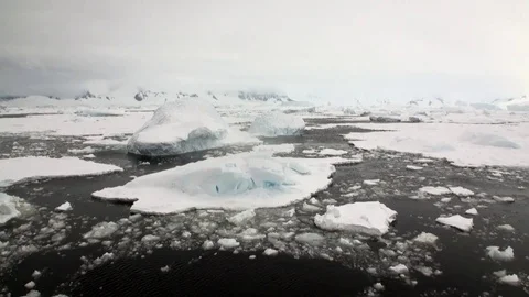 Ice movement and snow coastline in ocean of Antarctica. Stock Footage