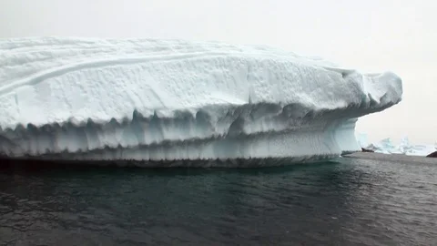 Ice movement and snow coastline in ocean of Antarctica. Stock Footage
