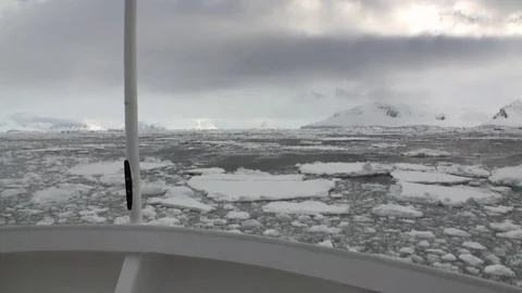 Ice movement and snow iceberg and glacier view from ship in ocean of Antarctica. Stock Footage