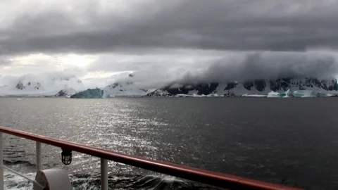 Ice movement and snow iceberg and glacier view from ship in ocean of Antarctica. Stock Footage