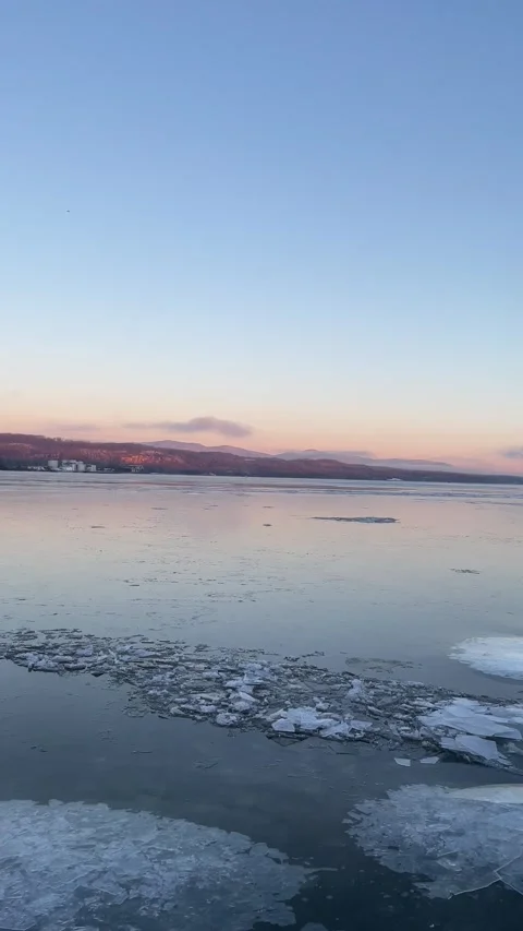 Ice Moving on Sunrise River Vertical Stock Footage 262589953