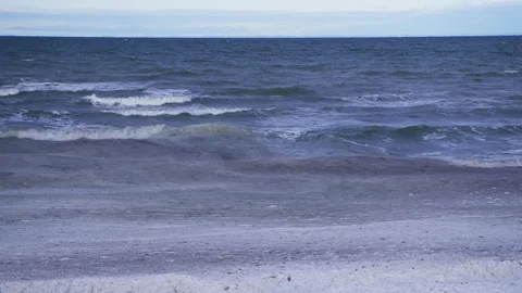 Ice ocean winter ocean river ripples shore Vidéo 258631972