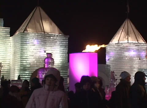Ice Palace light show 9, ice block castle construction back lit color changes Stock Footage 296344797