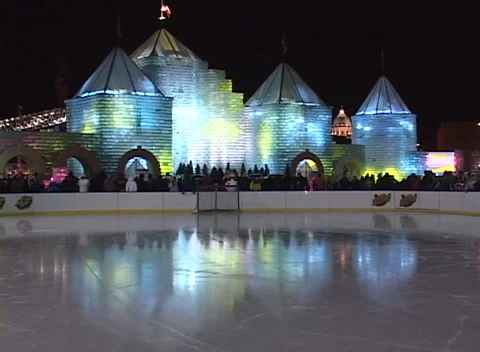 Ice Palace light show ice rink 1, wide shot of ice block castle lighting effects Video stock 296345171