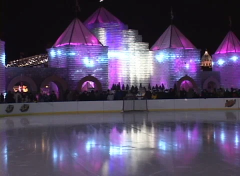 Ice Palace light show ice rink 5, wide shot of colorful changing lights, pans Stock Footage 296345888