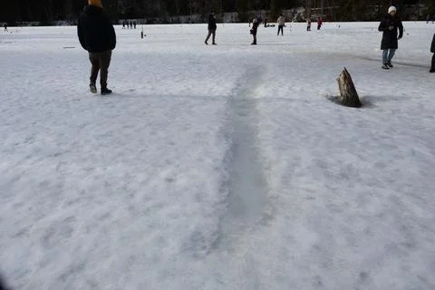 Ice path formed in the snow Stock Photos