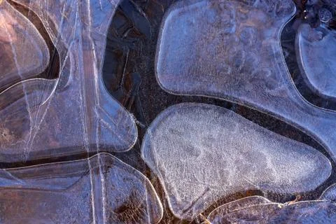 Ice pattern shapes background sunlight Foto stock