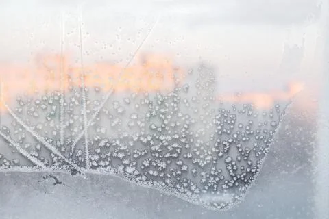 Ice pattern on window, winter background. Texture. Stock Photos