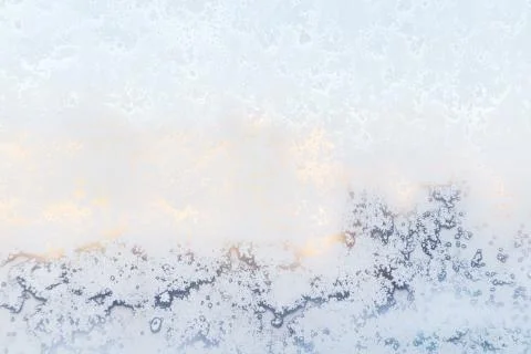 Ice pattern on window, winter background. Texture. Stock Photos