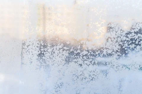 Ice pattern on window, winter background. Texture. Stock Photos
