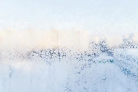 Ice pattern on window, winter background. Texture. Stock Photos