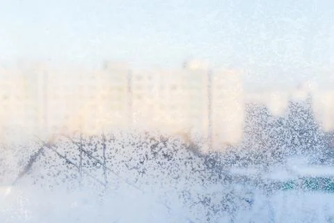Ice pattern on window, winter background. Texture. Stock Photos