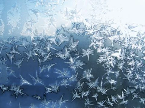 Ice pattern on winter glass Stock Photos