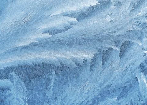 Ice pattern on winter glass Stock Photos