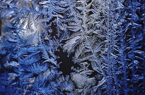 Ice pattern on winter glass Stock Photos