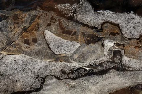 Ice patterns and bubbles Stock Photos