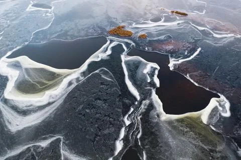Ice patterns and texture on the lake Stock Photos