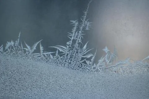 Ice patterns on frozen window Stock Photos