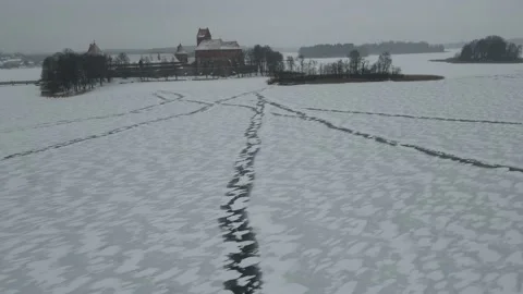 Ice patterns like ice road to the castle Stock Footage 167429061