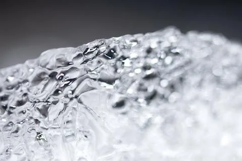 Ice patterns with sharp edges and air bubbles Stock Photos