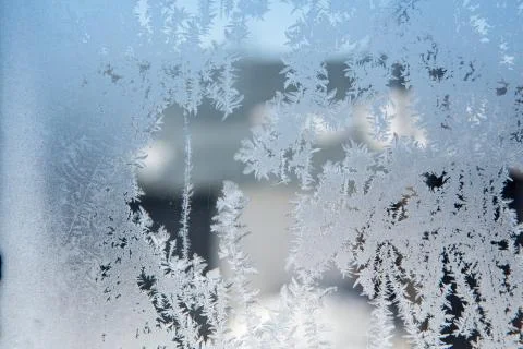 Ice patterns on winter glass Stock Photos