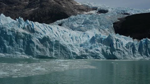 Ice of Perito Moreno glacier while falling Stock Footage 327712539