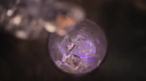 Ice is poured into a glass Stock Footage 61838873