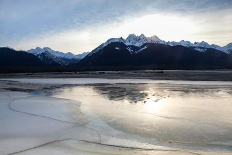Ice reflections after sunset Stock Photos