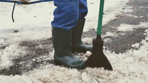 Ice removal from the pedestrian walkway yard area Stock Footage 227724688