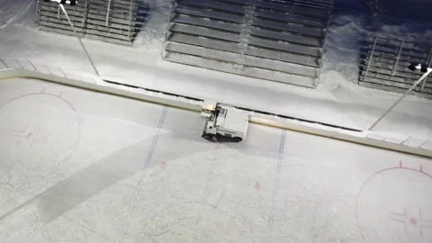 The ice resurfacer to clean and smooth the surface of a sheet of the ice rink Vídeos de archivo 130857714