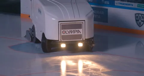 The ice-resurfacer machine makes the ice perfect before a hockey match Stock Footage 119542774