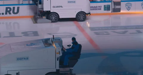 The ice-resurfacer machine makes the ice perfect before a hockey match Stock Footage 119543072
