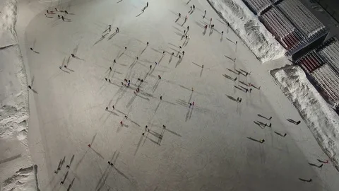 Ice rink open type, on which people skate Stock Footage 124626095