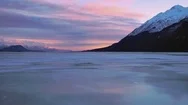 Ice River Alaska Sunset Run Toward Distant Mountains Aerial Stock Footage