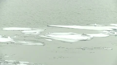 Ice on river, cracked ice float 2 Stock Footage 10819678