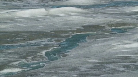 Ice River flowing down Glacier Stock Footage 74870745