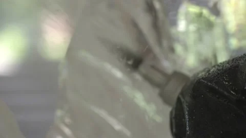 Ice sculptor using dremel closeup slow motion shot Stock Footage 228634709