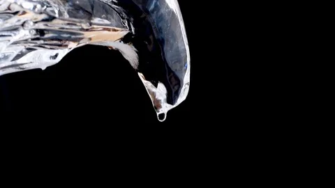 Ice sculpture. closeup of ice eagle head. black background Stock Footage 128388703